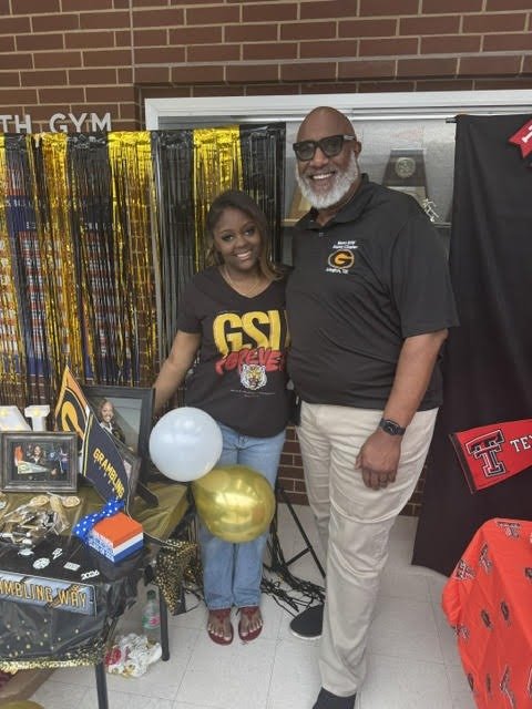 Chapter member volunteering at a Toys For Tots community drive